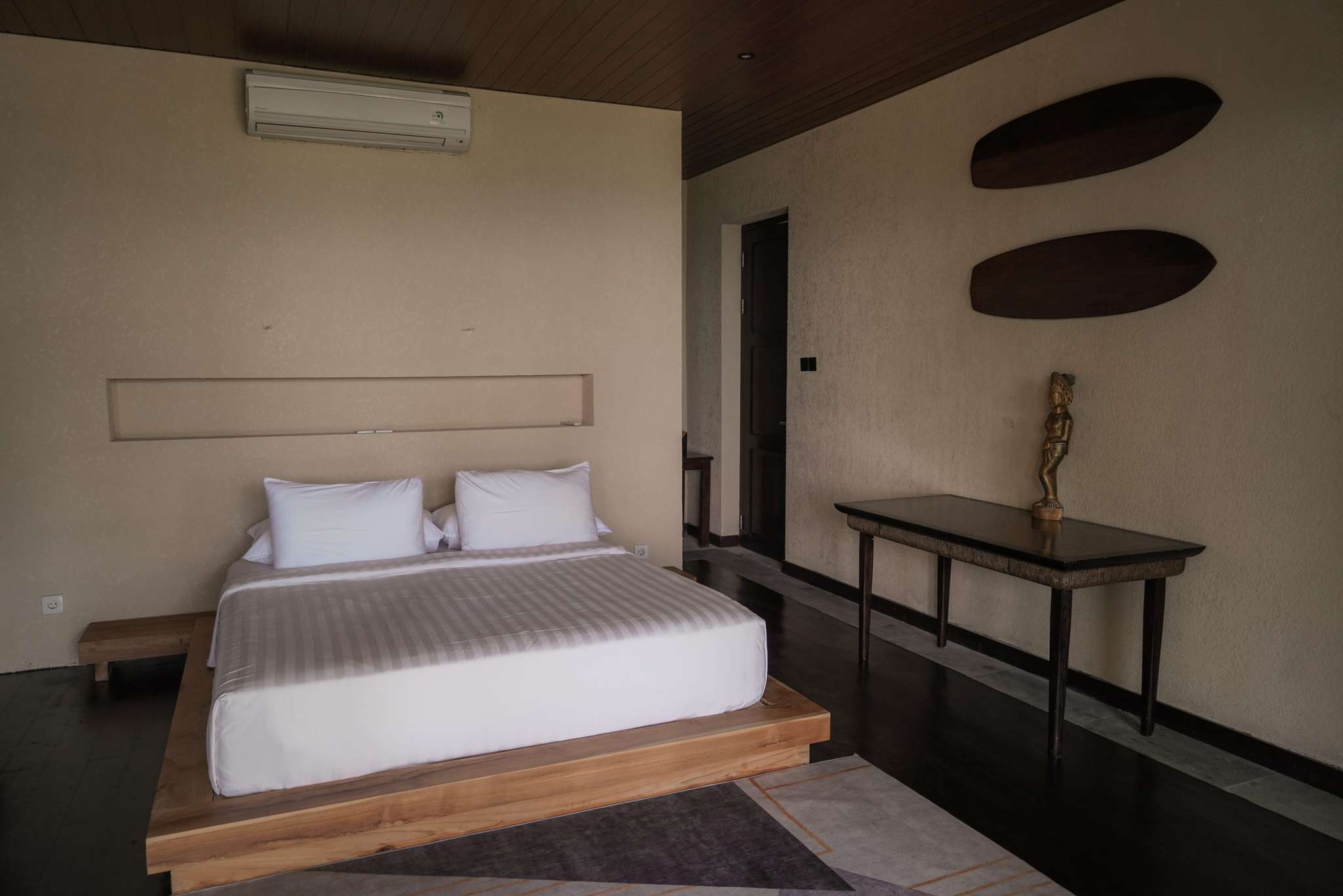 Tranquil bedroom nestled in the lower cliff level