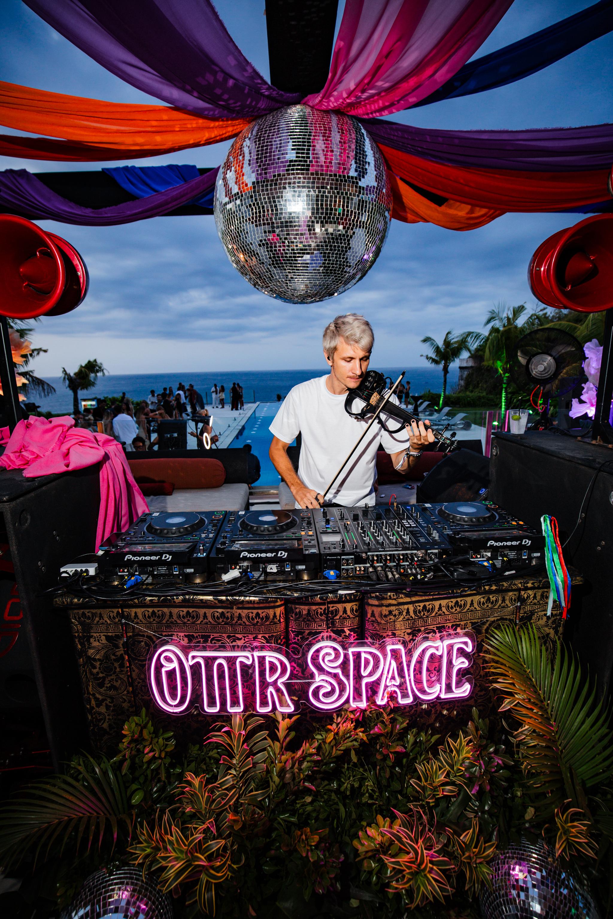 Outdoor DJ Stage with Ocean Backdrop